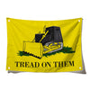 A yellow flag banner featuring a black shovel and a green blade with the text Tread on them.