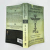 A hardcover book titled Becoming Supernatural by Dr Joe Dispenza with a green and black cover.