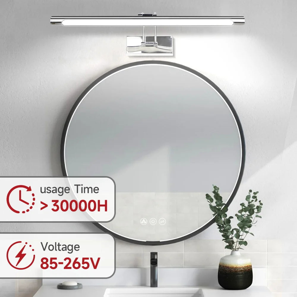 A modern LED mirror light fixture mounted above a round mirror in a bathroom setting.