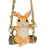 Handmade resin climbing monkey figurine with orange fur hanging from a tree branch