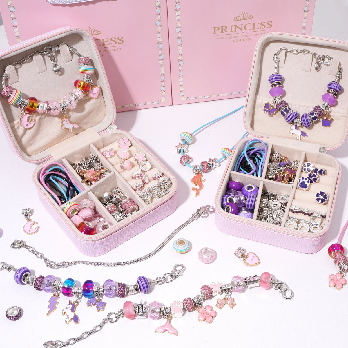 A collection of colorful beaded and silver bracelets, including necklaces and charms, displayed in a pink jewelry organizer b