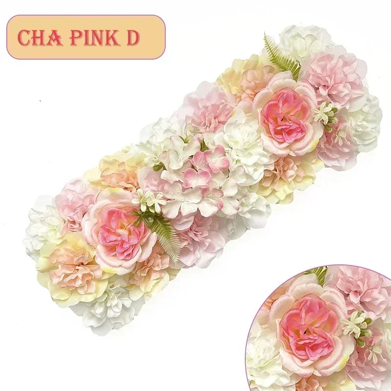 A floral arrangement of pink and white artificial silk roses and hydrangeas for weddings and events.