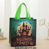 A dark green non-woven tote bag with a Halloween print featuring a castle silhouette and bats, displayed on a light surface.