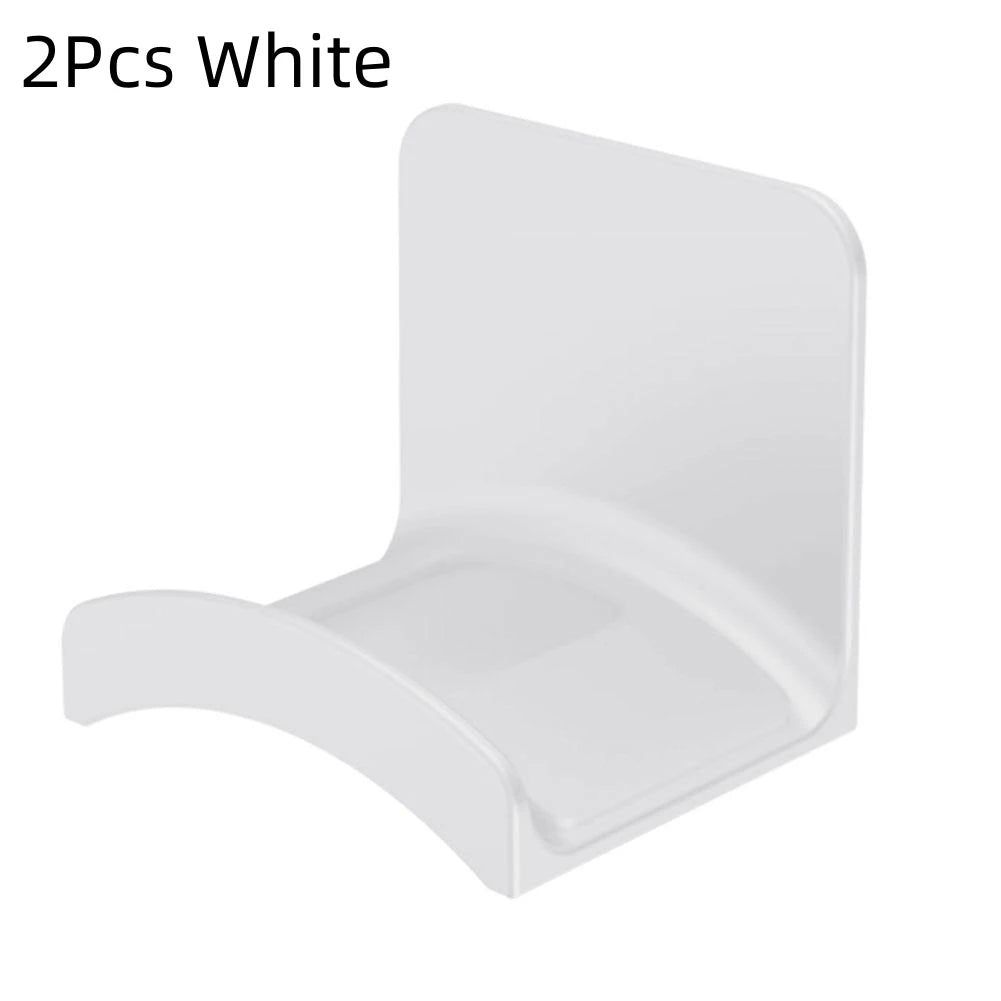A white universal wall-mounted headphone holder and hanger.