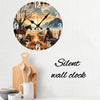 A rustic wooden wall clock showing a clock face with a silhouette of a cowboy and horse against a sunset landscape.