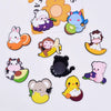 A collection of twelve soft pastel animal fridge magnets featuring characters like a white rabbit, purple hedgehog, and pink 