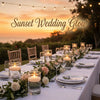 Sunset wedding glow featuring elegant glass candles and greenery on a white table.
