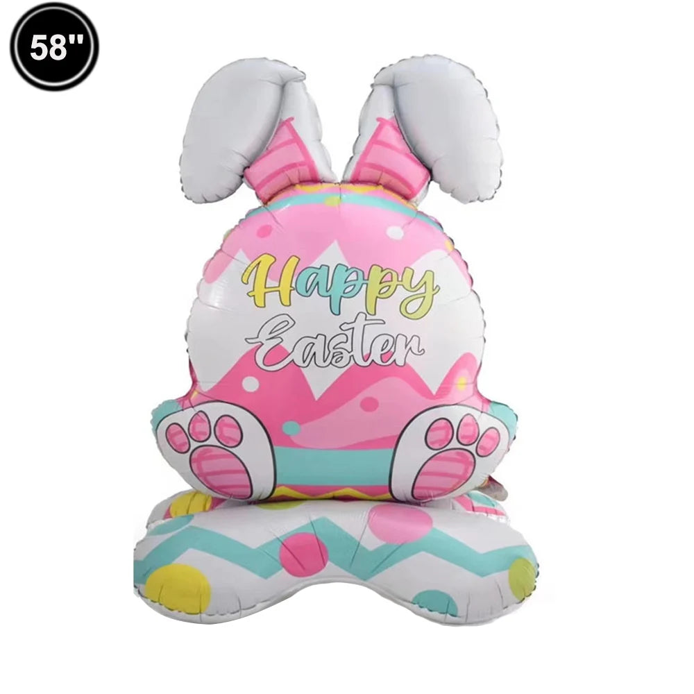 A pink and white foil balloon shaped like a bunny with long ears, celebrating Easter.