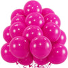 A cluster of bright pink latex balloons tied together for a party or celebration.
