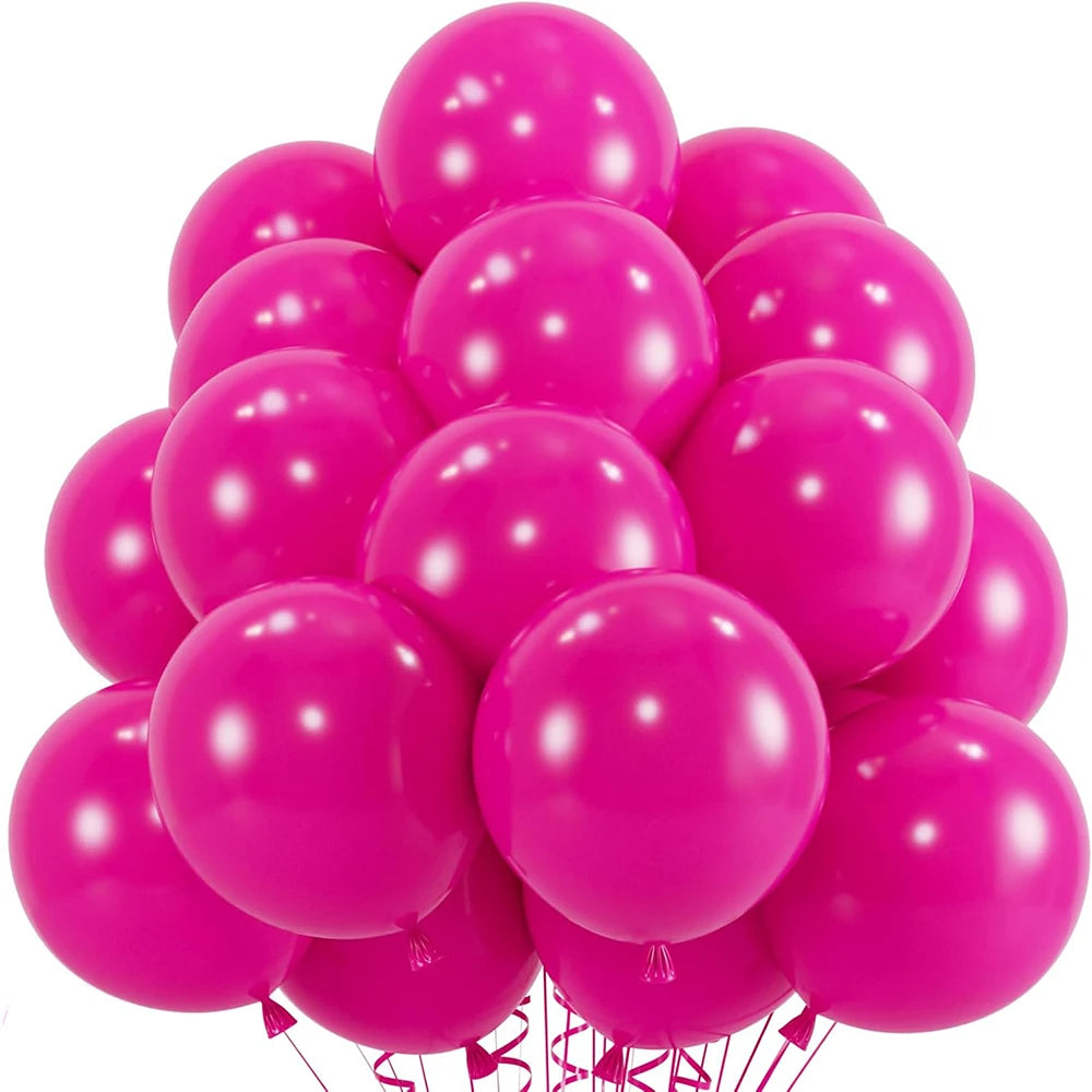 A cluster of bright pink latex balloons tied together for a party or celebration.