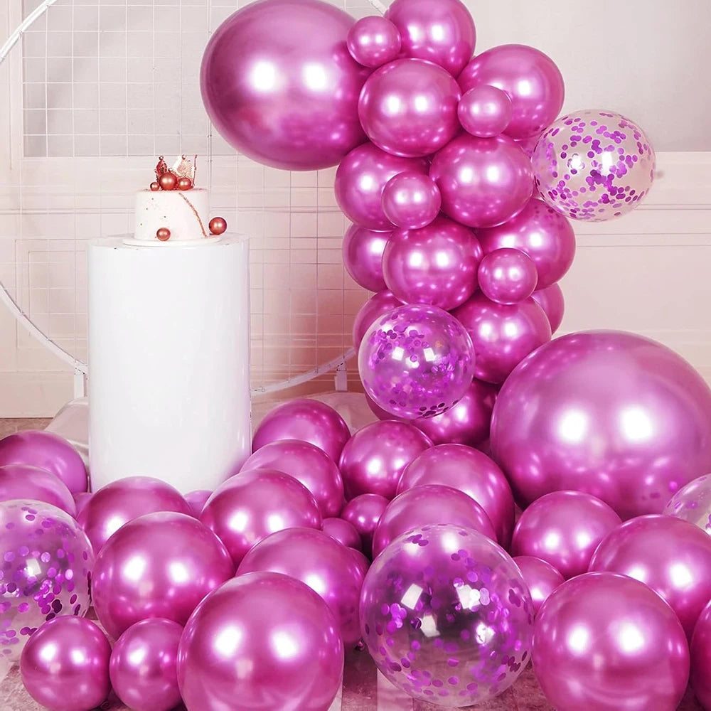 A pink and purple metallic balloon garland arch kit featuring balloons and confetti accents.