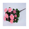 A cluster of pink and coral artificial azalea flowers on green leaves.