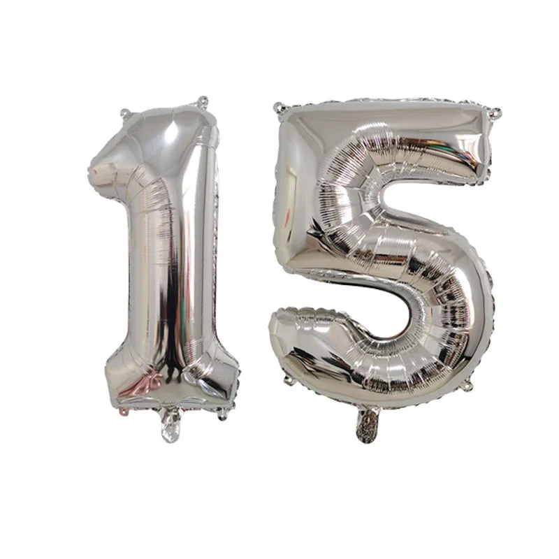 Silver foil number balloon spelling out fifteen for birthday party decor