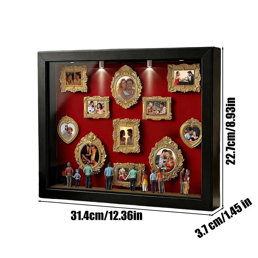 A black display case featuring framed photos and figurines illuminated by LED lights.