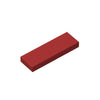 A smooth building brick in a reddish-brown color shown at an angle.