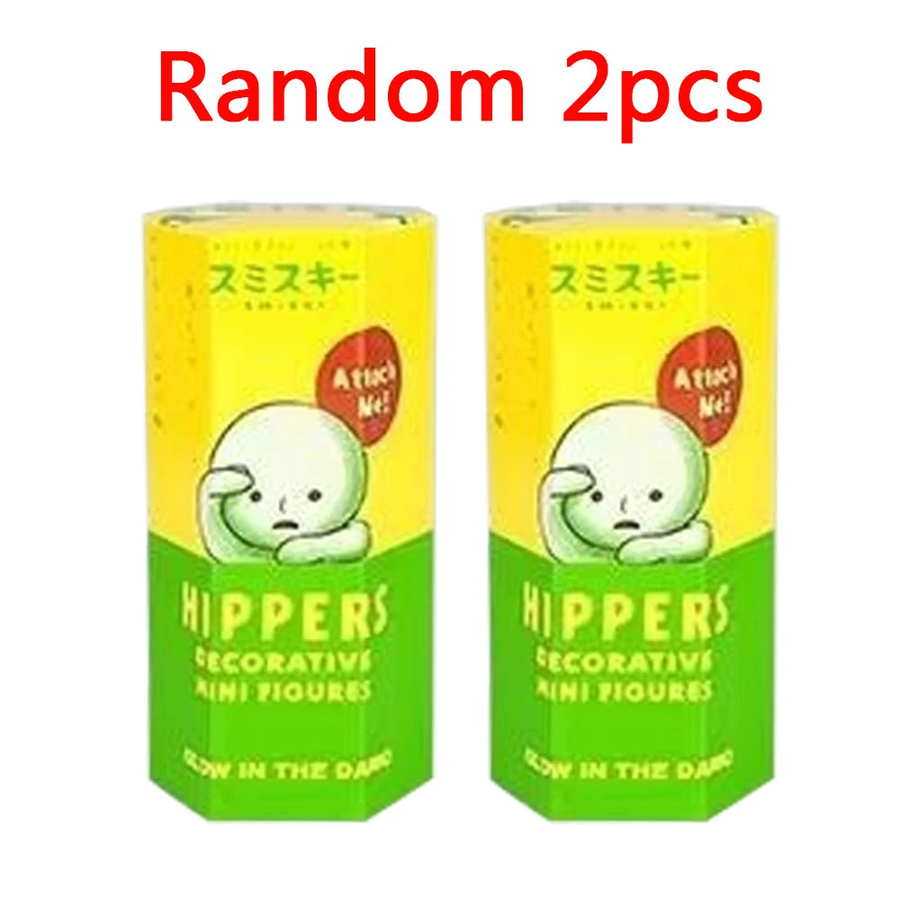 Two glow-in-the-dark Hippers decorative mini figures in yellow packaging.