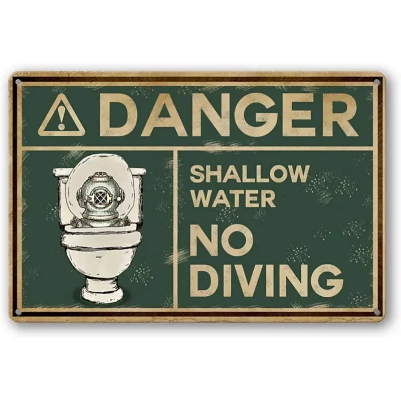 Vintage tin sign with a warning about shallow water and no diving