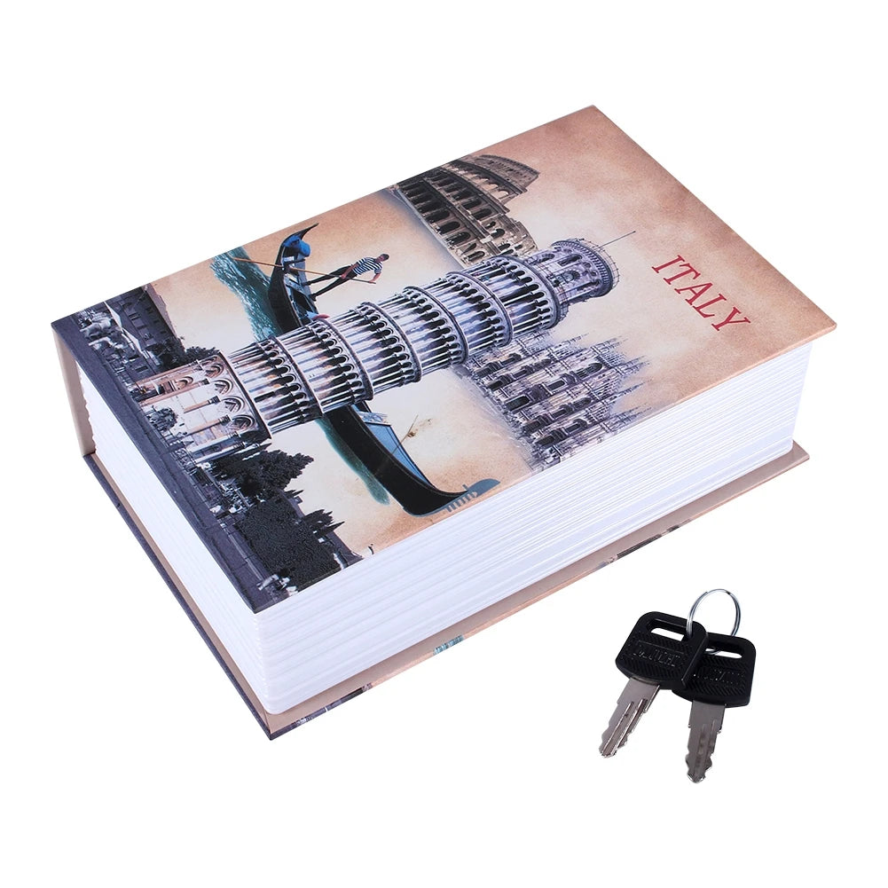 A book titled Italy with a picture of a ship and city ruins, next to a black key lock box.
