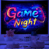 A vibrant purple and blue UV reactive game controller tapestry displayed on a wall.