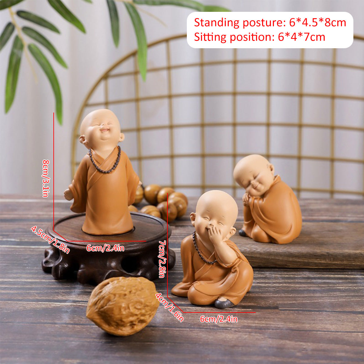 A set of cute little monk resin figurines in brown color displayed on a wooden surface with size measurements.