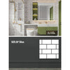 A modern bathroom or kitchen wall featuring marble-patterned decals and green cabinetry.