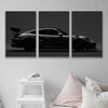 Three panels of black sports car silhouette wall art featuring a sleek, low-profile vehicle.