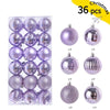A set of 36 iridescent and silver Christmas baubles for holiday tree and decor.