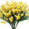 A bundle of bright yellow artificial flowers used for home and event decoration.