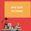 A bright orange square background with white text that reads only sew no holes