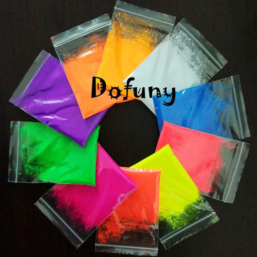 A collection of 13 vivid neon fluorescent pigment powders in various colors like orange, yellow, green, pink, and blue, packa
