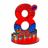 A large red wooden number eight with a spider design and birthday text on the base.