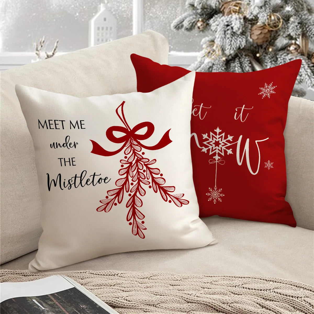 Red Christmas cushion covers featuring a white bow and wreath design on a festive background
