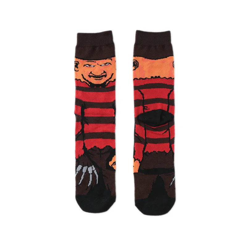 Pair of novelty crew socks featuring skull, alien, and tiger prints in red and black stripes.