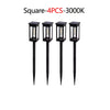 Four black square solar pathway lights with illuminated bulbs for outdoor decor