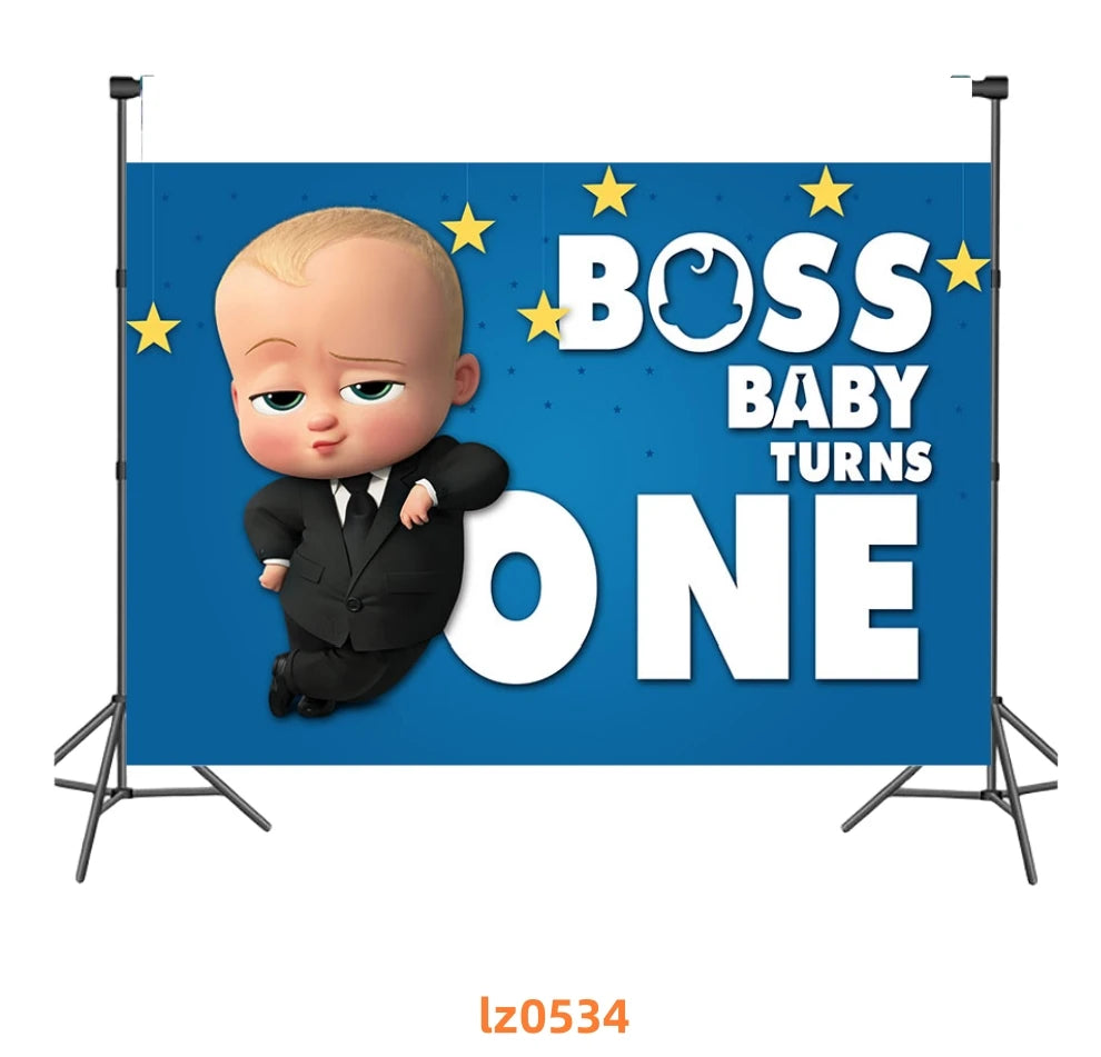 A blue banner featuring a cartoon baby dressed in a suit, with text that reads Boss Baby Turns One and yellow stars.