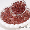 A clear glass bowl filled with reddish-brown round spacer beads for jewelry making