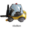 A yellow construction truck foil balloon decorated with a clear window showing a black seat inside.