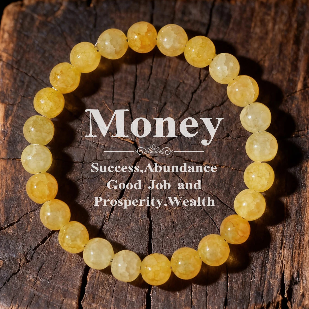 A bracelet made of small, round yellow citrine crystals is laid on a dark wooden surface.