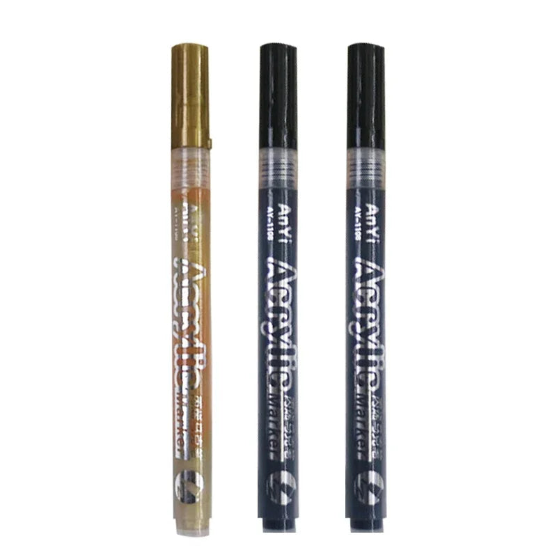 Three tubes of Extra-Fine Point Acrylic Paint Pens for multi-surface art displayed vertically.