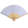 A white and light wood bamboo folding fan with pleated paper blades.