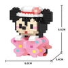A model kit of a black and white animal character with a pink hat and pink body parts made from micro building blocks.