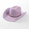 A light purple wool cowboy hat with a brown studded leather band.
