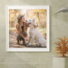 A woman in a hat is smiling while petting a white dog outdoors, displayed as framed wall art.