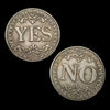 Antique silver-gray decision coin showing the word YES on one side and NO on the other