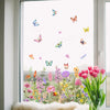 Window decal featuring colorful butterflies and flowers on a clear glass pane
