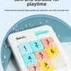 A white magnetic sliding block puzzle with numbered pieces and small white foam blocks for playtime.