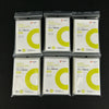 A set of 12 clear protective card sleeves in yellow and green packaging for cards.