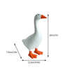 White magnetic goose key holder with orange beak and feet, shown in a side view.