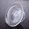 Clear acrylic serving plate with a decorative, sunburst pattern for desserts or salads.