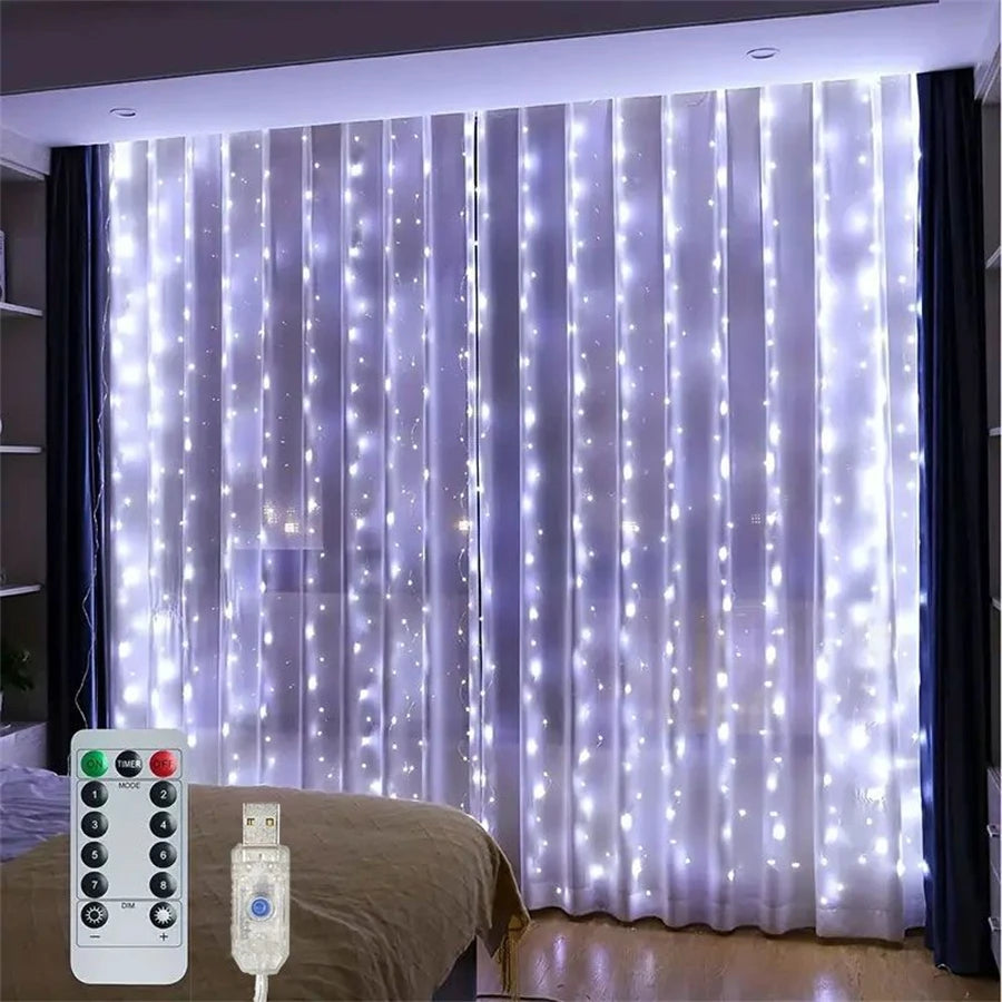 LED curtain string lights hanging in a window with a remote control visible nearby